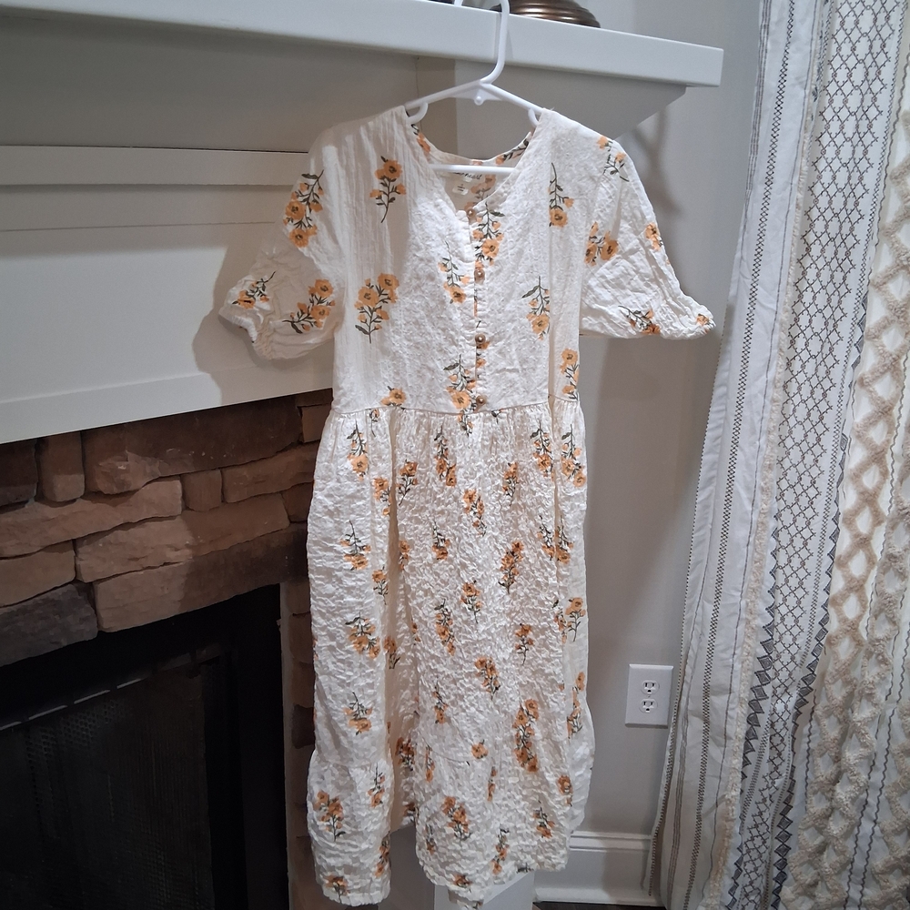 Floral White Dress with Orange Accents